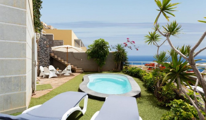 Duplex Acorán with pool and sea view